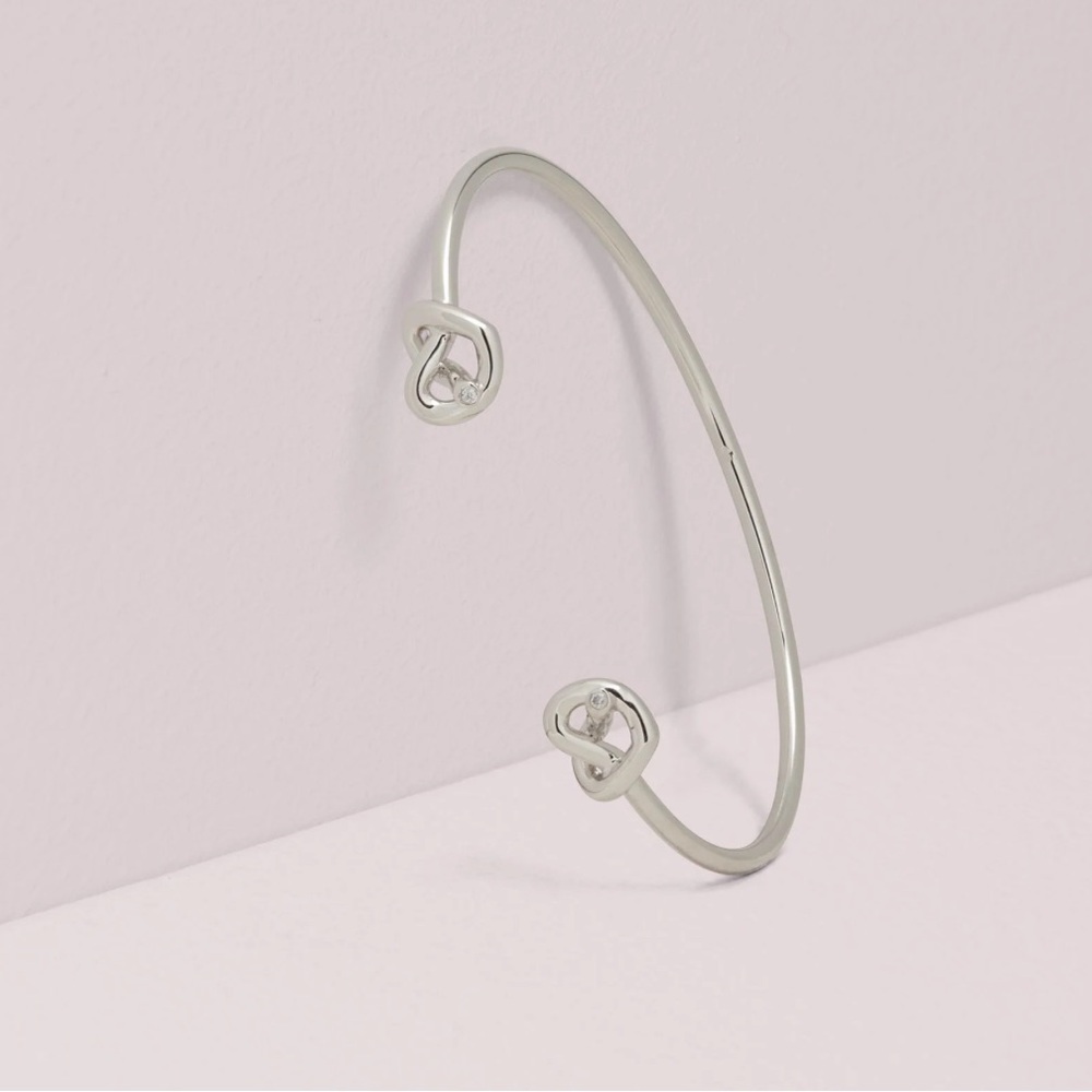 $78 Kate Spade Loves me Knot Double Heart Dainty Cuff Bracelet  in silver - Picture 1 of 4